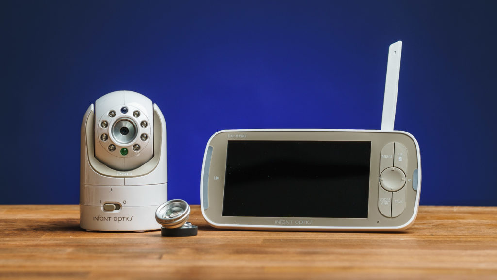 Infant Optics Pro on a table with a blue background