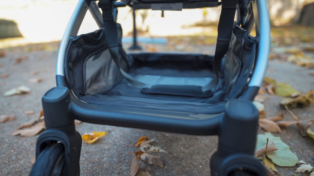 The under the seat storage area of the Uppababy Minu