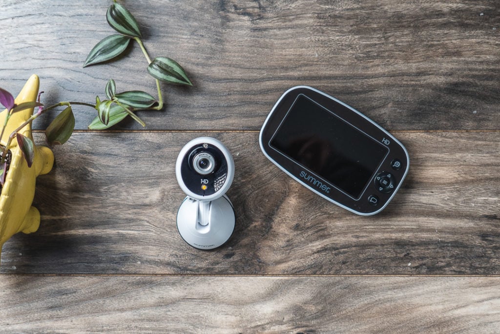 A Summer Infant Pixel Zoom HD camera and parent unit on a table